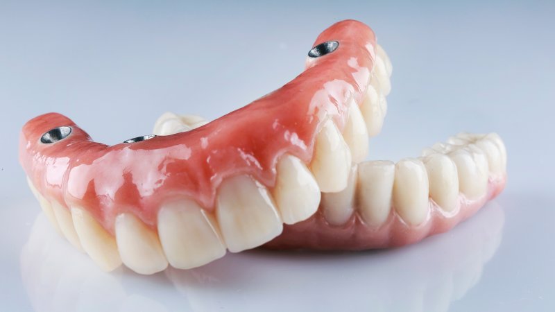 A closeup of unplaced implant dentures